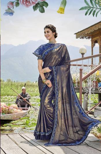 Grab This Very Beautiful Trendy Saree In Blue Color. This Saree Is Fabricated On Lycra Paired With Art Silk Blouse And Net Fabricated Heavy Embroidered Cape. Its Fabric Is Light Weight And Ensures Superb Comfort Throughout The Gala.