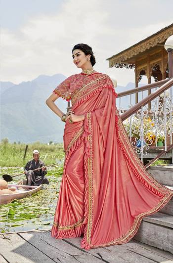 Grab This Very Beautiful Trendy Saree In Dark Peach Color. This Saree Is Fabricated On Lycra Paired With Art Silk Blouse And Net Fabricated Heavy Embroidered Cape. Its Fabric Is Light Weight And Ensures Superb Comfort Throughout The Gala.