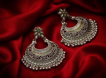 Give A Traditional Touch To Your Look With Pairing This Beautiful Pair Of Earrings In Silver Color. This Pretty Pair Can Be Paired With Any Colored Attire Which Give An Enhanced Look To Your Personality. 