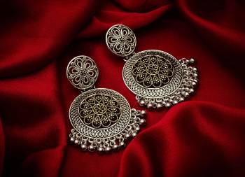 Give A Traditional Touch To Your Look With Pairing This Beautiful Pair Of Earrings In Silver Color. This Pretty Pair Can Be Paired With Any Colored Attire Which Give An Enhanced Look To Your Personality. 