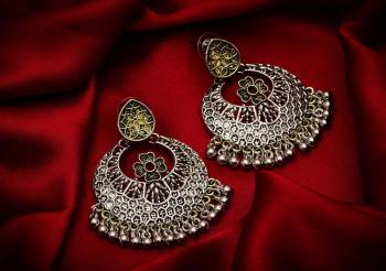 Give A Traditional Touch To Your Look With Pairing This Beautiful Pair Of Earrings In Silver Color. This Pretty Pair Can Be Paired With Any Colored Attire Which Give An Enhanced Look To Your Personality. 