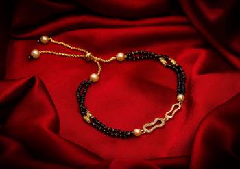 Here Is Very Pretty And Trending Mangalsutra Bracelet In Black And?Gold. This Mangalsutra Bracelet Has A Pretty Delicate Design And Pattern Which Gives An Elegant Look To Your Wrist. Buy This Latest Trend Now.?