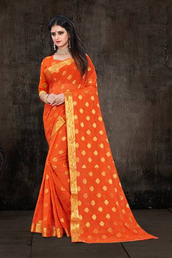 Here Is A Pretty Weaved Saree In Orange Color. This?Saree Is Fabricated On Chiffon Paired With Art Silk Fabricated Blouse. It Is Beautified With Attractive Weave All Over. Also It Is Light In Weight And Easy To Carry All Day Long. 