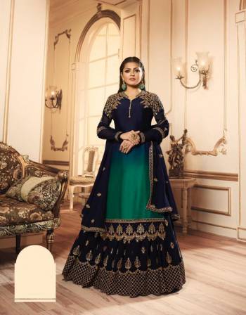 Very Beautiful Shaded Indo-Western Suit Is Here In Navy Blue And Teal Green color. Its Beautiful Top IS Fabricated On Georgette Satin Paired With santoon Bottom, Georgette Fabricated Lehenga And Dupatta.Buy This Designer Two In One Suit Now.