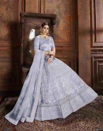 Beautiful And Elegant Looking Shade Is Here To Add Into Your Wardrobe With This Heavy Designer Lehenga Choli In Steel Blue Color. This Lehenga Choli And Dupatta Are Fabricated On Net Beautified With Heavy Detailed Embroidery. Buy Now.