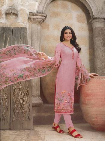 Look Pretty In This Designer Straight Suit In Pretty Pink Color. This Semi-Stitched Suit Is Fabricated On Crepe Paired With Santoon Bottom And Chiffon Fabricated Dupatta. It Has Pretty Floral Prints And Subtle Embroidery. 