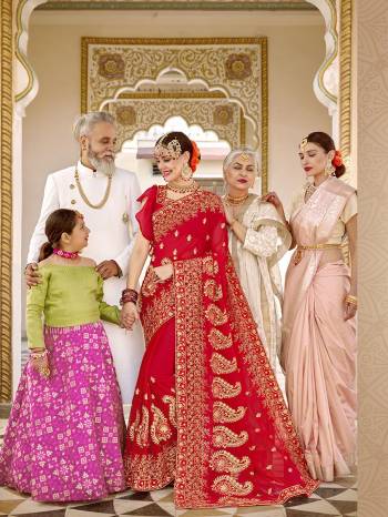 Here Is Beautiful Collection In Bridal Sarees With This Designer?Saree In Red Color Paired With Red Colored Blouse. This Saree And Blouse are Fabricated On Georgette Beautified With Heavy Jari And Resham Embroidery With Stone Work. This Beautiful Heavy Saree Will A Proper Bridal Look And Will Earn You Lots Of Compliments From Onlookers