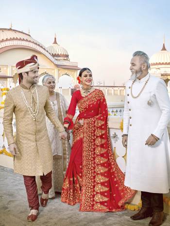 Here Is Beautiful Collection In Bridal Sarees With This Designer?Saree In Red Color Paired With Red Colored Blouse. This Saree And Blouse are Fabricated On Georgette Beautified With Heavy Jari And Resham Embroidery With Stone Work. This Beautiful Heavy Saree Will A Proper Bridal Look And Will Earn You Lots Of Compliments From Onlookers