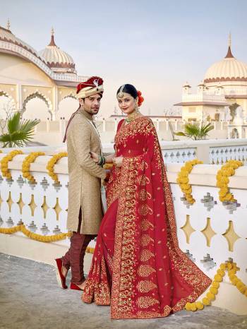 Here Is Beautiful Collection In Bridal Sarees With This Designer?Saree In Red Color Paired With Red Colored Blouse. This Saree And Blouse are Fabricated On Georgette Beautified With Heavy Jari And Resham Embroidery With Stone Work. This Beautiful Heavy Saree Will A Proper Bridal Look And Will Earn You Lots Of Compliments From Onlookers