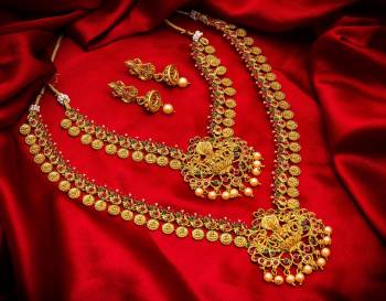 To Give A Heavy Tradiotional Look, Grab This Beautiful Set Of Necklace Which Contains Two Necklaces And A Pair Of Earring. This Necklace Set Can Be Paired With Any Colored Traditional Attire And Also Can Be Wore Both At A Time Or Single As Per The Occasion.