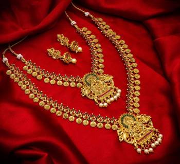 To Give A Heavy Tradiotional Look, Grab This Beautiful Set Of Necklace Which Contains Two Necklaces And A Pair Of Earring. This Necklace Set Can Be Paired With Any Colored Traditional Attire And Also Can Be Wore Both At A Time Or Single As Per The Occasion.