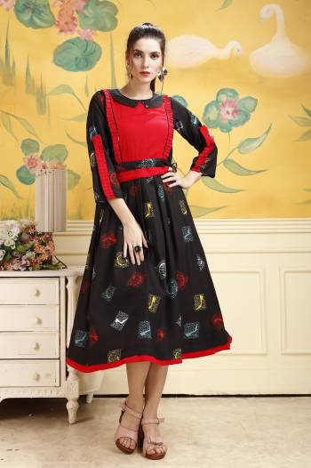 Add This Beautiful Kurti To Your Wardrobe In Black Color. This Kurti Is Fabricated On Rayon Beautified With Prints All Over. Buy This Kurti Now.