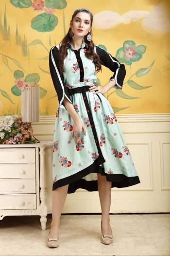 Add This Beautiful Kurti To Your Wardrobe In Baby Blue Color. This Kurti Is Fabricated On Rayon Beautified With Prints All Over. Buy This Kurti Now.