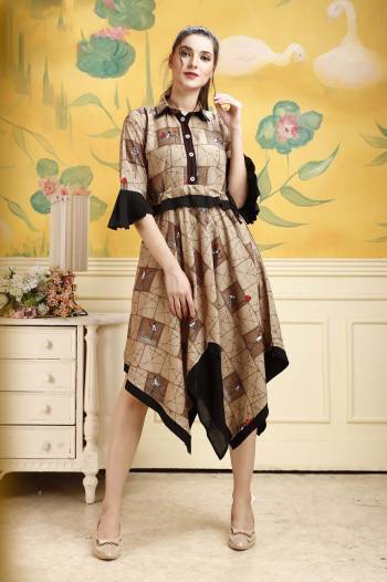 Grab This Pretty Readymade Tunic In Brown Color For Your Semi-Casual Wear. This Pretty Kurti Is Fabricated On Rayon Beautified With Prints All Over. Buy This Pretty Piece Now.