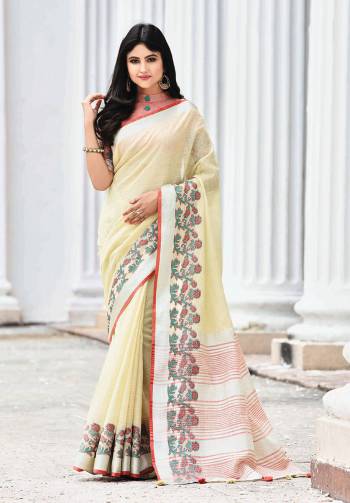 Celebrate This Festive Season with beauty and Comfort In This Lovely Cream Colored saree Paired With Red Colored Blouse. This Saree And Blouse Are Fabricated On Linen Which Gives A Rich And Elegant Look. Buy This Pretty Saree Now.