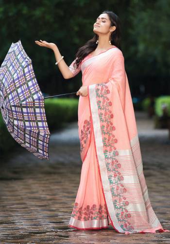 Flaunt Your Rich And Elegant Taste Wearing This Pretty Saree In Peach Color Paired With Peach Colored Blouse. This Saree And Blouse Are Fabricated On Linen Beautified With Floral Weave. It Is Light In Weight And Gives A Rich Look To Your Personality. 