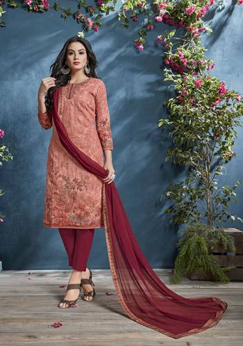 Look Pretty In Wearing This Lovely Semi-Stitched Suit In Dark Peach Color Paired With Maroon Colored Bottom And Dupatta. Its Top IS Fabricated On Cotton Beautified With Prints And Tone To Tone Resham Work Paired With Santoon Bottom And Chiffon fabricated Dupatta. Buy Now.