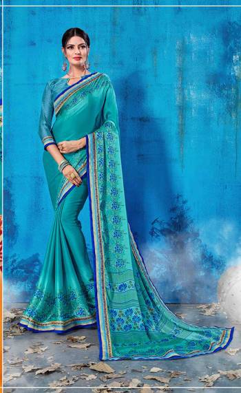 For Your Semi-Casual Wear, Grab This Pretty Saree In Blue Color Paired With Blue Colored Blouse. This Saree And Blouse Are Fabricated On Soft Silk Beautified With Prints All Over. This Saree Is Light Weight, Soft Towards Skin And Easy To Carry All Day Long. 
