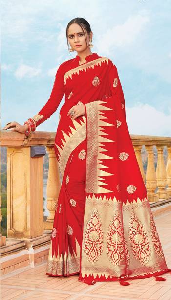 Get Ready For The Upcoming Wedding & Festive Season With This Pretty Saree In Red Color Paired With Red Colored Blouse. This Saree And Blouse Are Fabricated On Art Silk Beautified With Weave All Over. Its Lovely Color and Weave Will Give An Attractive Look To Your Personality. 