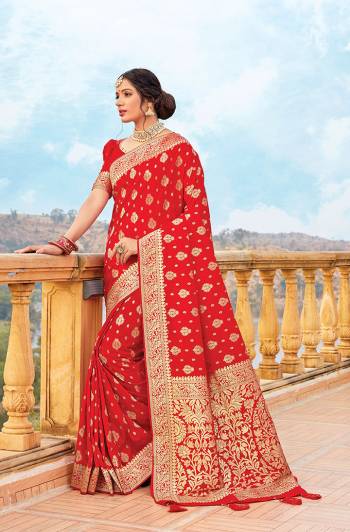 Get Ready For The Upcoming Wedding & Festive Season With This Pretty Saree In Red Color Paired With Red Colored Blouse. This Saree And Blouse Are Fabricated On Art Silk Beautified With Weave All Over. Its Lovely Color and Weave Will Give An Attractive Look To Your Personality. 