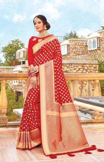 Get Ready For The Upcoming Wedding & Festive Season With This Pretty Saree In Red Color Paired With Red Colored Blouse. This Saree And Blouse Are Fabricated On Art Silk Beautified With Weave All Over. Its Lovely Color and Weave Will Give An Attractive Look To Your Personality. 