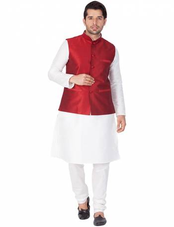 Here Is A Rich And Decent Looking Readymade Pair Of Men's Kurta Pyjama In White Color Paired With Red Colored Jacket. This Kurta And Pyjama Are Fabricated On Cotton Silk Paired With Art Silk Fabricated Jacket. Buy This Pair For The Upcoming Wedding And Festive Season. 