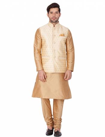 Here Is A Rich And Decent Looking Readymade Pair Of Men's Kurta Pyjama In Beige Color Paired With Cream Colored Jacket. This Kurta And Pyjama Are Fabricated On Cotton Silk Paired With Jacquard Silk Fabricated Jacket. Buy This Pair For The Upcoming Wedding And Festive Season. 