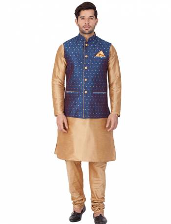 Here Is A Rich And Decent Looking Readymade Pair Of Men's Kurta Pyjama In Beige Color Paired With Royal Blue Colored Jacket. This Kurta And Pyjama Are Fabricated On Cotton Silk Paired With Jacquard Silk Fabricated Jacket. Buy This Pair For The Upcoming Wedding And Festive Season. 