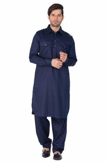 Get Ready For The Upcoming Festive Season With This Readymade Pair Of Pathani Kurta Pyjama For Men's Wear. This Rich Navy Blue Colored Pair Is Fabricated On Cotton Which Is Light Weight, Soft Towards Skin And Available In All Sizes. Buy Now.