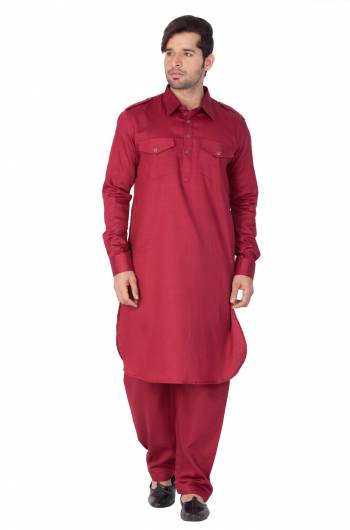 Get Ready For The Upcoming Festive Season With This Readymade Pair Of Pathani Kurta Pyjama For Men's Wear. This Rich Maroon Colored Pair Is Fabricated On Cotton Which Is Light Weight, Soft Towards Skin And Available In All Sizes. Buy Now.