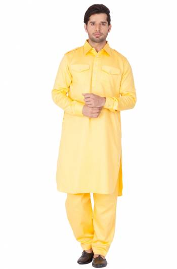 Get Ready For The Upcoming Festive Season With This Readymade Pair Of Pathani Kurta Pyjama For Men's Wear. This Rich Yellow Colored Pair Is Fabricated On Cotton Which Is Light Weight, Soft Towards Skin And Available In All Sizes. Buy Now.