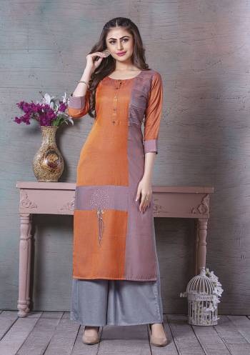 Add This Pretty Readymade Kurti To Your Wardrobe In Turquoise Orange Color Fabricated On Rayon. It Is Beautified With Prints And Thread Work. Also It Is Available In All Regular Sizes. Buy Now.