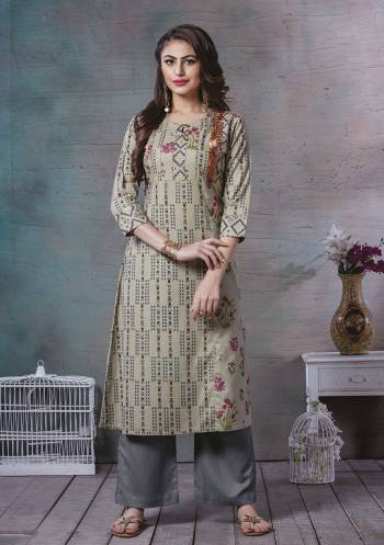 For Your Semi-Casuals, Grab This Readymade Kurti In Olive Green Color. This Kurti Is Fabricated On Rayon Cotton Beautified With Prints And Thread Work. It Is Light In Weight And Easy To Carry All Day Long. 