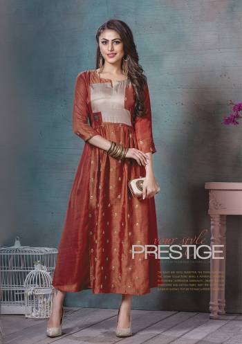 Grab This Beautiful Kurti In Rust Orange Color Fabricated On Art Silk. This Pretty Readymade Kurti Is Beautified With Pints And Thread Work. Also Its Fabric Ensures Superb Comfort All Day Long. 