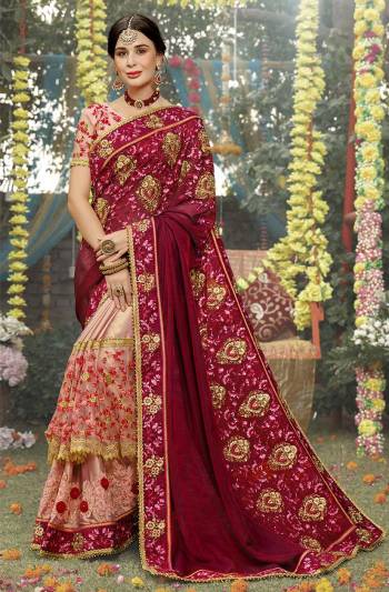 Get Ready For The Upcoming Wedding Season With This Heavy Designer Saree In Maroon And Baby Pink Color Paired With Baby Pink Colored Blouse. This Heavy Embroidered Saree And Blouse Are Silk Based With Highlight Pattern Of Embroidered Net And Attractive Satin Over The Saree Skirt. Buy This Pretty Saree Now.