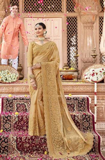 Flaunt Your Rich And Elegant Taste Wearing This Heavy Designer Tone To Tone Embroidered Saree In Beige Color. This Saree Is Fabricated On Chiffon Paired With Art Silk Fabricated Blouse. It Is Light Weight  And Easy To Carry Throughout The Gala. 