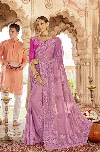 Flaunt Your Rich And Elegant Taste Wearing This Heavy Designer Tone To Tone Embroidered Saree In Pink Color. This Saree Is Fabricated On Chiffon Paired With Art Silk Fabricated Blouse. It Is Light Weight  And Easy To Carry Throughout The Gala. 