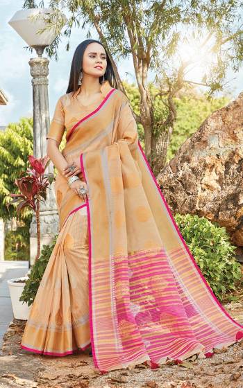Celebrate This Festive Season With Beauty And Comfort Wearing This Pretty Saree In Beige Color. This Saree And Blouse are Fabricated On Linen Cotton Which Gives A Rich Look To Your Personality. 