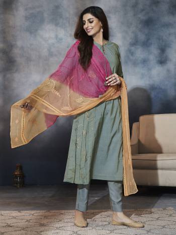 This Festive Season, Adorn A Rich Traditional Look Wearing This Designer Readymade Suit In Steel Blue Color Paired With Contrasting Pink And Orange Colored Dupatta. Its Top Is Fabricated On Cotton Silk Paired With Cotton Satin Bottom And Super Net Fabricated Dupatta. 