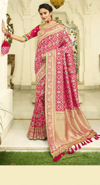 Celebrate This Festive Season In A Lovely Traditional Look With This Heavy Designer Saree In Dark Pink Color Paired With Dark Pink Colored Blouse. This Saree Is Fabricated on Banarasi Art Silk Beautified With Heavy Weave Paired with Art Silk Fabricated Blouse Beautified With heavy Embroidery.