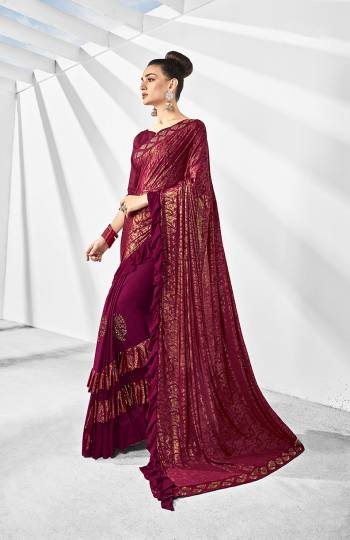 Here Is A Trending Frill Pattern Designer Saree In Dark Magenta Pink Paired With Dark Magenta Pink Colored Blouse. This Saree Is Fabricated On Lycra Paired With Art Silk Fabricated Blouse. It Is Beautified With Frill And Stone Work. 