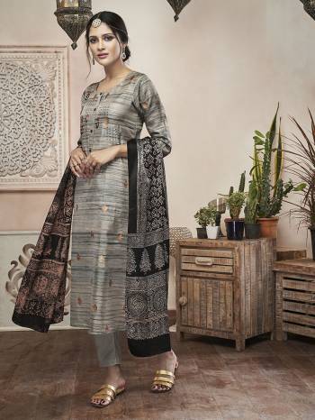 Rich And Elegant Looking Designer Readymade Straight Suit IS Here In Grey Color Paired With Black Colored Dupatta. Its Top IS Fabricated On Art Silk Paired With Satin Silk Bottom And Art Silk Dupatta. 