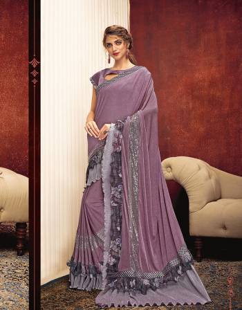 Beautifully exemplify your infectious creative energy in this unique saree with double crush-fabric frill and look strikingly beautiful. 