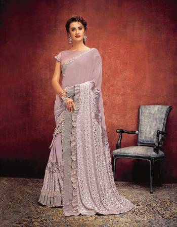 Experimental style and modern elegance come together in this frilly-style saree giving you a breathtaking outlook. 