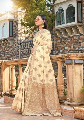 For Your Semi-Casuals, Grab This Saree In Cream Color Paired With?Cream Colored Blouse. This Saree And Blouse Are Fabricated On Handloom Cotton Which Is Durable, Light Weight And Easy To Carry All Day Long