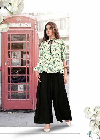 Be It Your College, Semi-Casuals Or Outing, Grab This Designer Readymade Pair Of Top And Bottom In Off-White And Black Color Respectively. Its top Is Fabricated On Cotton Paired With Rayon Fabricated Bottom. 