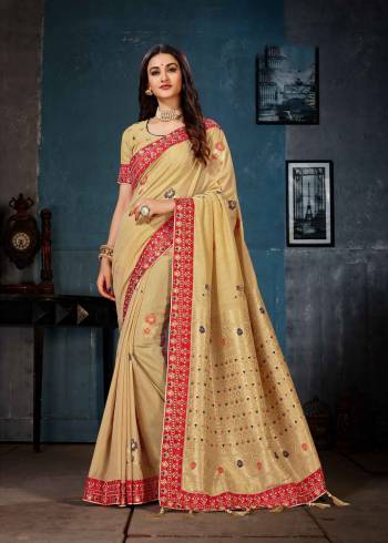 Celebrate This Festive Season Wearing This Heavy Designer Saree In Cream Color. This Lovely Saree And Blouse Are Fabricated On Linen Cotton Silk Beautified With Weave And Embroidery. Buy This Saree Now.