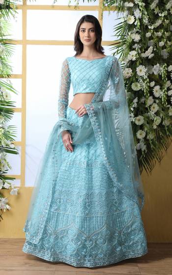 Flaunt Your Rich and Elegant Taste Wearing This Heavy Designer Lehenga Choli In Sky Blue Color. This Pretty Tone To Tone Embroidered Lehenga Choli Is Fabricated On Net. Also It Is Light Weight And Easy To Carry Throughout The Gala.