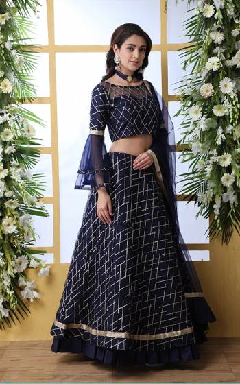 Flaunt Your Rich and Elegant Taste Wearing This Heavy Designer Lehenga Choli In Navy Blue Color. This Pretty Tone To Tone Embroidered Lehenga Choli Is Fabricated On Net. Also It Is Light Weight And Easy To Carry Throughout The Gala.