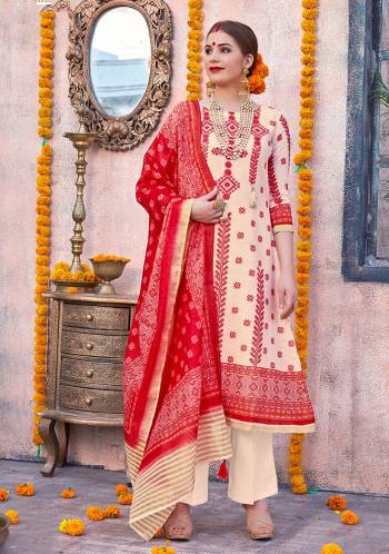 Flaunt Your Rich and Elegant Taste Wearing This Designer Suit In Cream And Red Color. Its Top Is Fabricated On Linen Paired With Cotton Fabricated Bottom And Chanderi Fabricated Dupatta. This Pretty Suit Is Suitable For Your Semi-Casuals Or Festive Wear. 